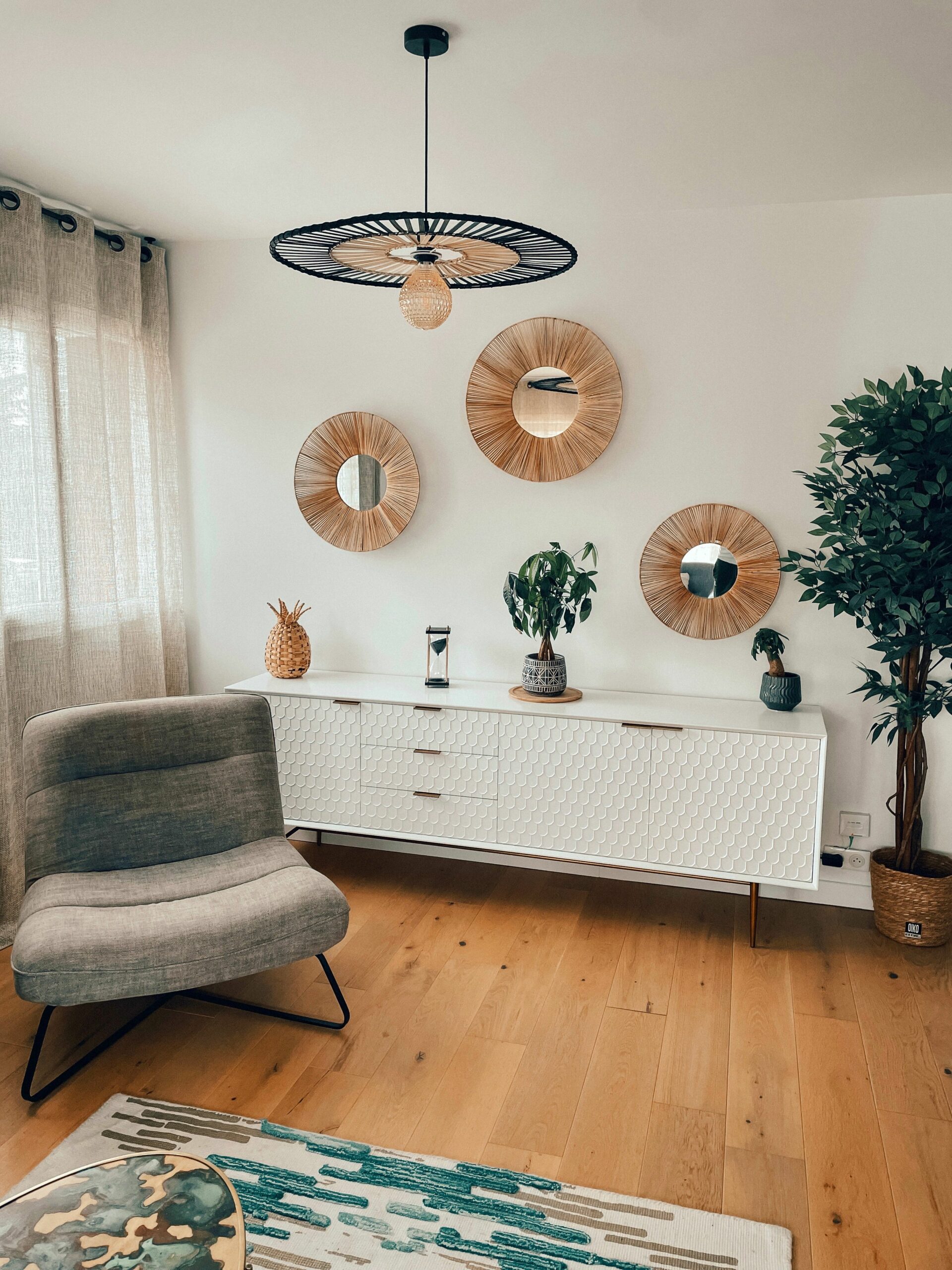 A welcoming Scandinavian living room featuring modern furniture and decor elements.